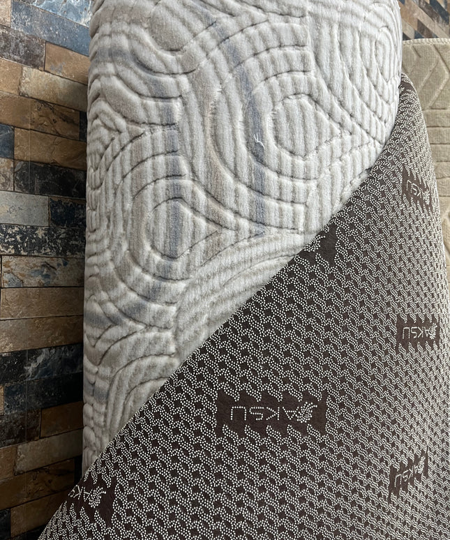 Tapis sur mesure "arc et vague" Ardasia